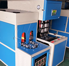 Machine de soufflage de bouteilles